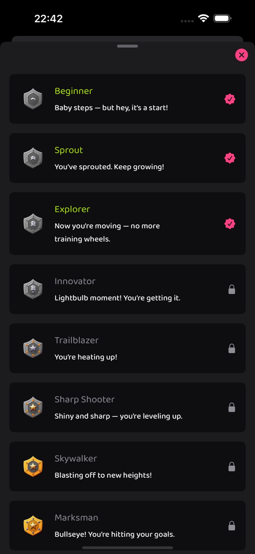 Mojiboom badge levels from Beginner through Marksman